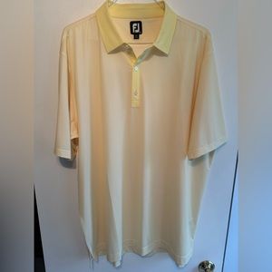 Light yellow FootJoy polo. Never worn without tags